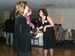 Susan dancing the night away while Karen talks