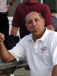 Lou Veltre enjoying his cigar