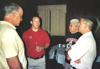 Kurt Bacci'75, Coach Kevin Manning'95, Kevin Wada'73